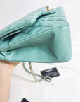 CHNL 21S Green Medium caviar leather with light gold-tone hardware