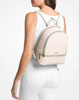 Rhea Medium Pebbled Leather Backpack (LT CREAM)