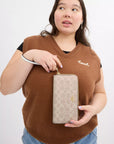 Long Zip Around Wallet In Signature Canvas (Gold/Sand/Chalk)