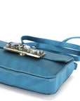 PRD BP CLUTCH TURQUOISE RASO STONES, WITH CARD & DUST COVER