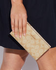 Slim Zip Wallet In Signature Canvas (Gold/Light Khaki Chalk)