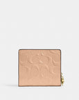 Snap Wallet In Signature Leather With Charm (Gold/Faded Blush)