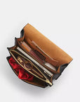 Mini Klare Crossbody Bag In Signature Canvas (Gold/Walnut/Black)