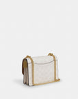 Mini Klare Crossbody Bag In Signature Canvas (Gold/White/Chalk)