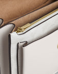 Mini Klare Crossbody Bag In Signature Canvas (Gold/White/Chalk)