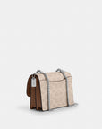 Mini Klare Crossbody Bag In Signature Canvas (Silver/Sand/Taupe)