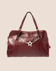 CHRISTIAN DOR BURGUNDY LEATHER PIERCED HARDCORE TOTE BAG