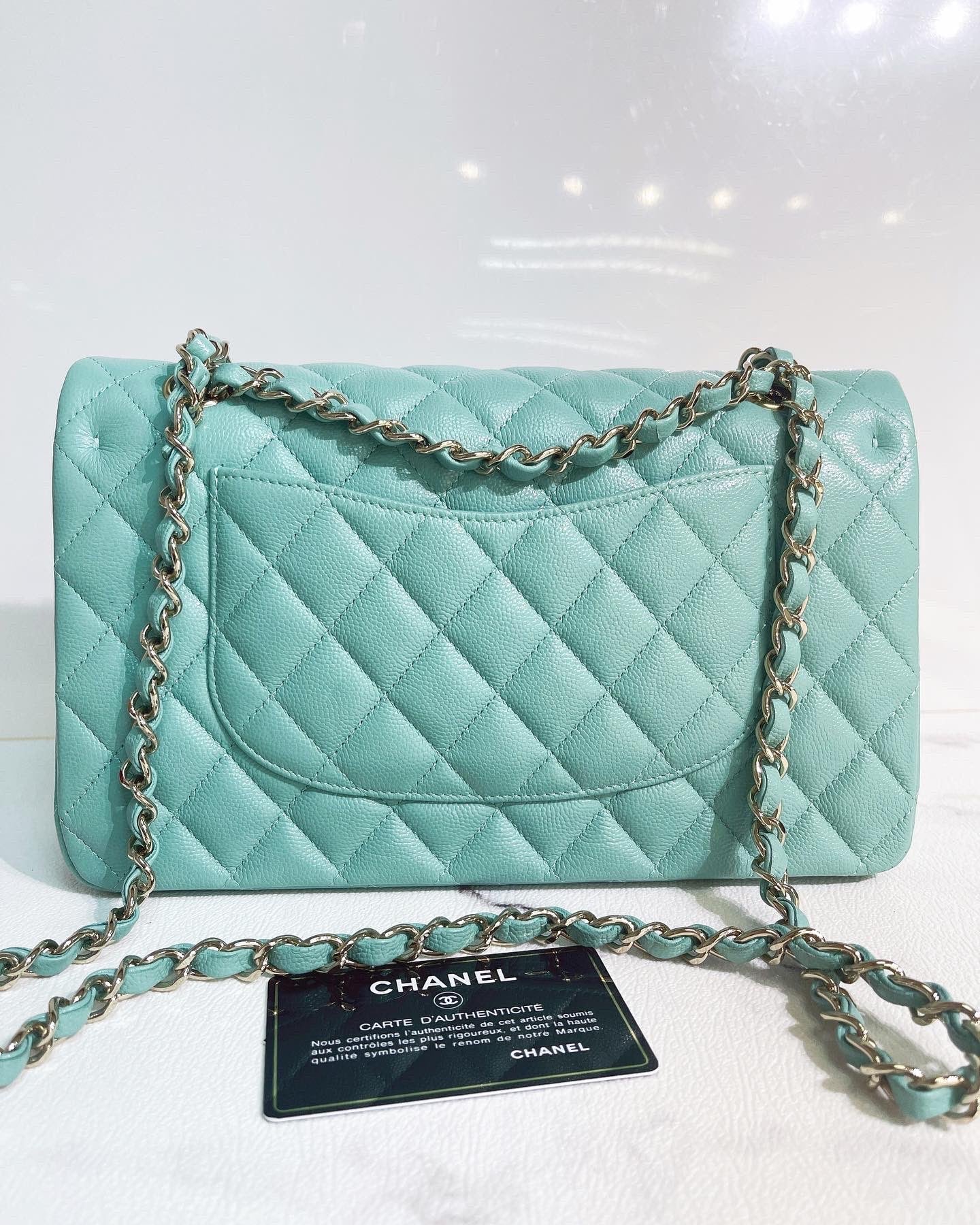 CHNL 21S Green Medium caviar leather with light gold-tone hardware