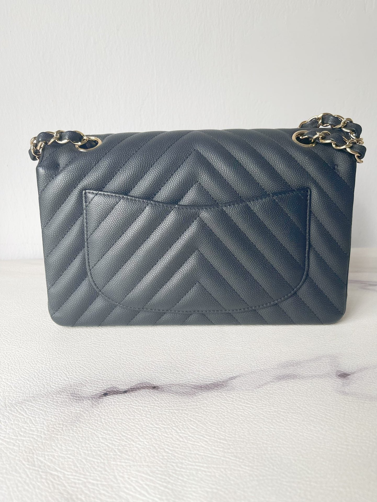 CHNL 19S Classic Small Double Flap Black Matte Chevron Caviar with light gold hardware
