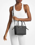 Voyager Extra-Small Pebbled Leather Convertible Crossbody Bag (BLACK)