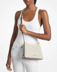 Christina Small Signature Logo Crossbody Bag (VANILLA)