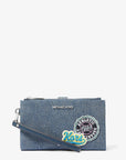 Jet Set Travel Embellished Denim Wristlet (WASHED DENIM)