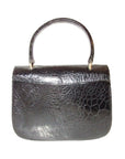Giorgio GCCI, Bamboo style, dark navy crocodile leather, top handle purse with sterling hardware, a boxy, structured shape, & an envelope style top