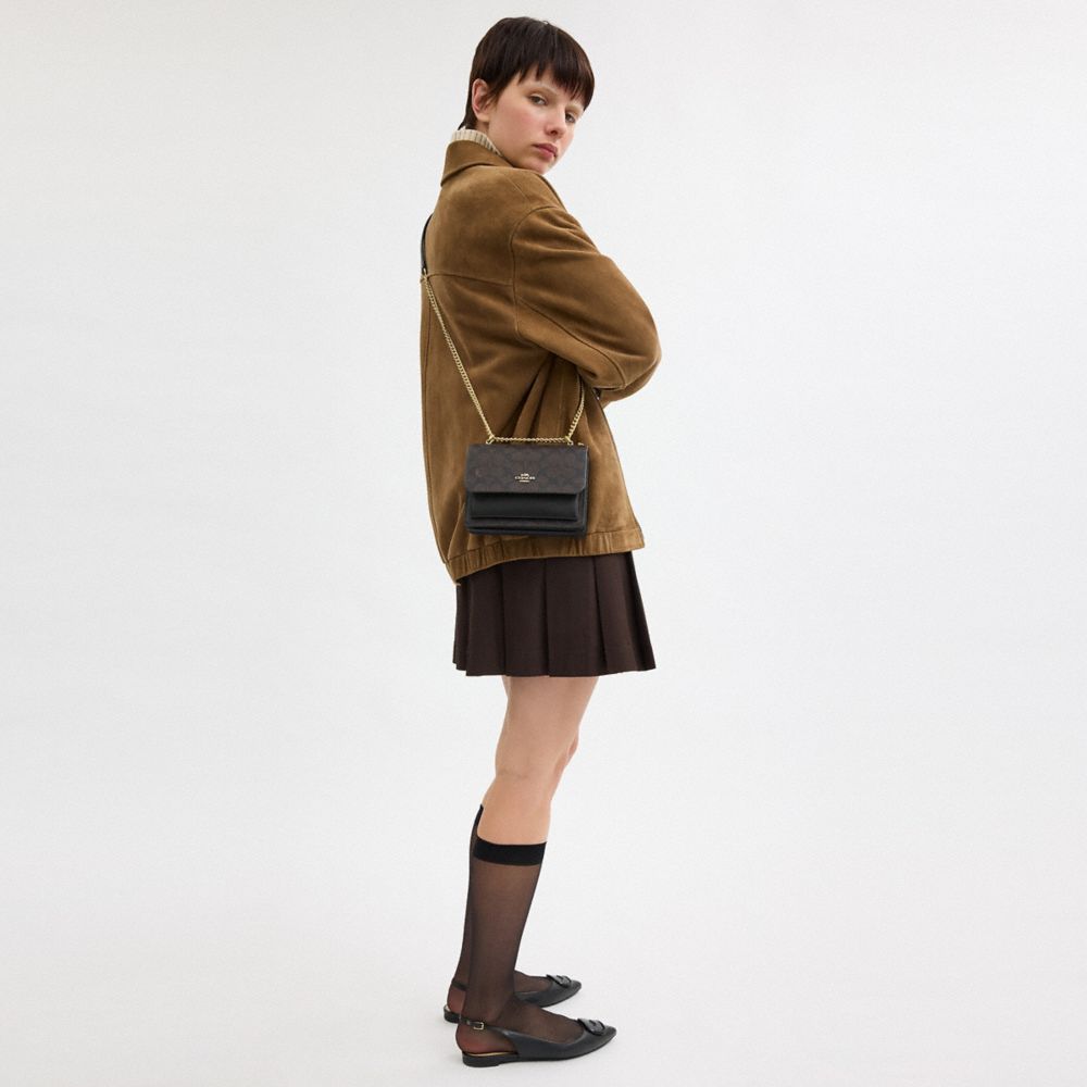Mini Klare Crossbody Bag In Signature Canvas (Gold/Walnut/Black)