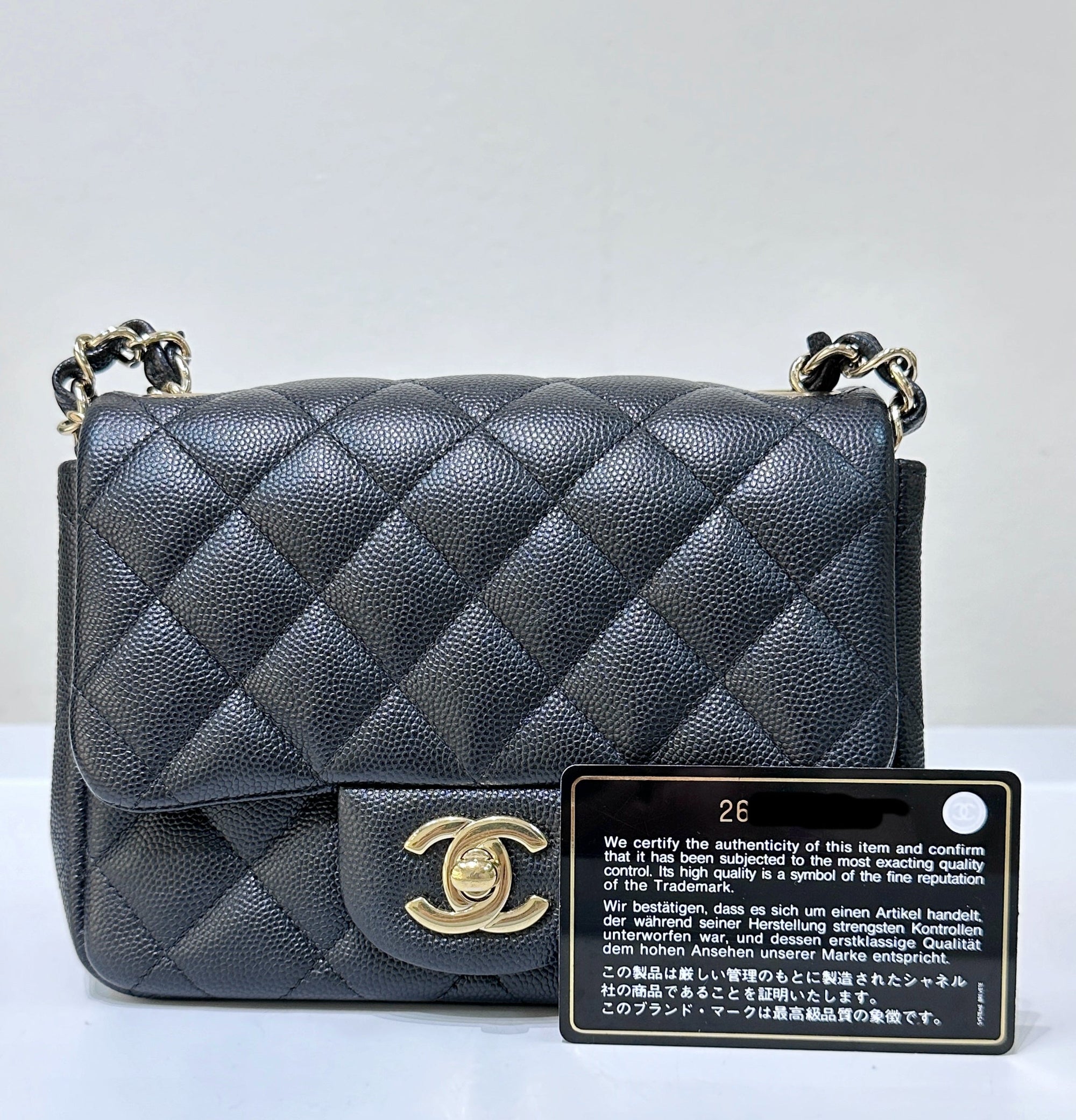 CHNL Black Mini Square Caviar Flap Bag Gold Hardware