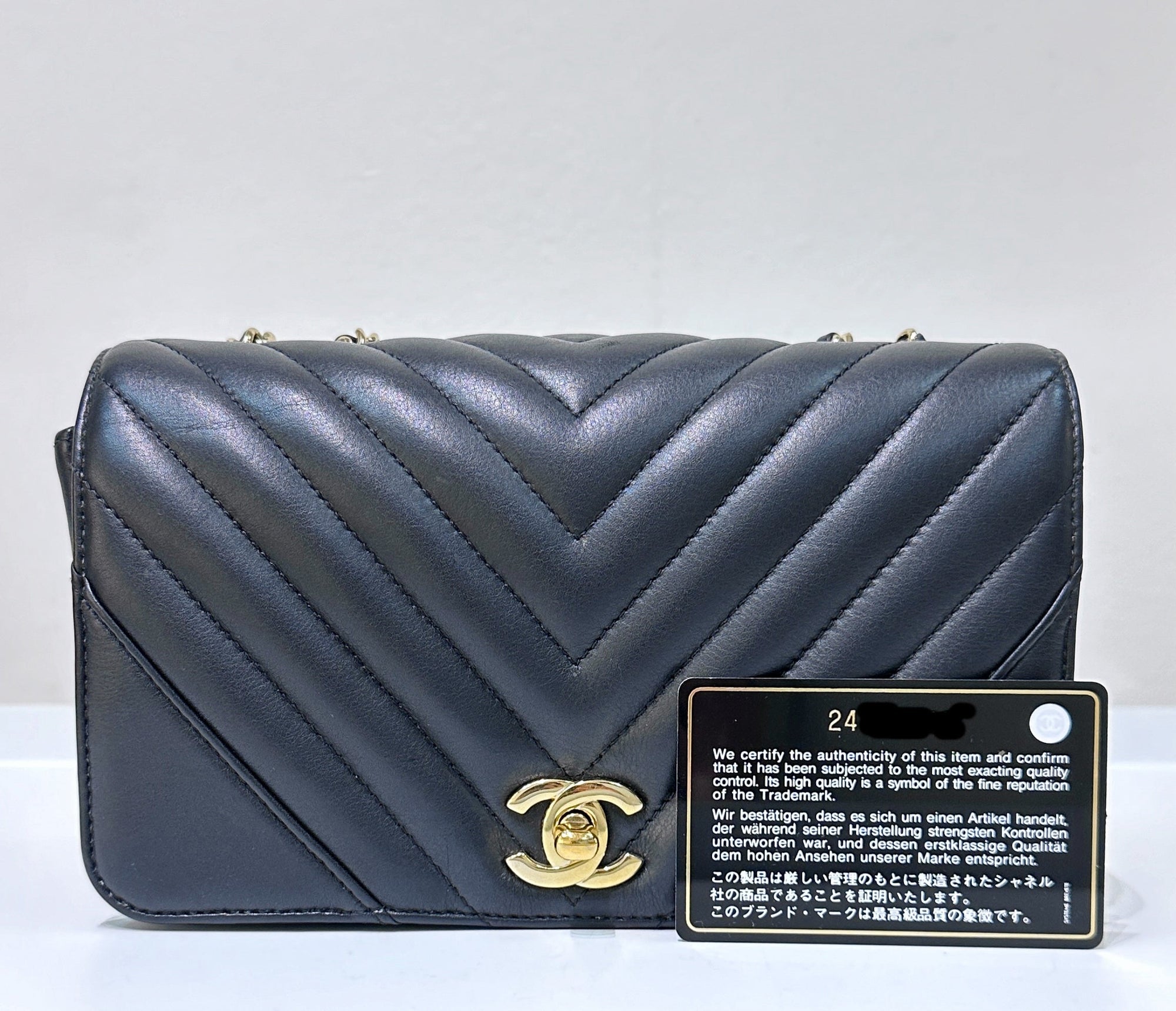 CHNL Calfskin Chevron Quilted Mini Statement Flap Black