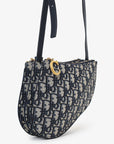 Christian DOR Oblique Canvas Saddle Triple Zip Crossbody bag