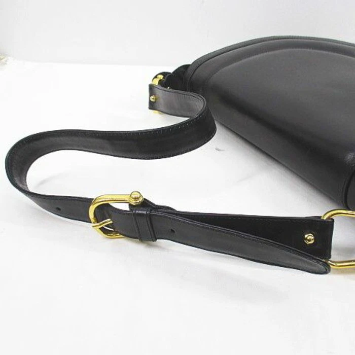 'Cosci' by GCCI black leather two way saddle bag with gold equestrian accents