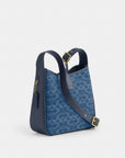 Hadley Convertible Crossbody Bag In Signature Denim (Gold/Indigo)