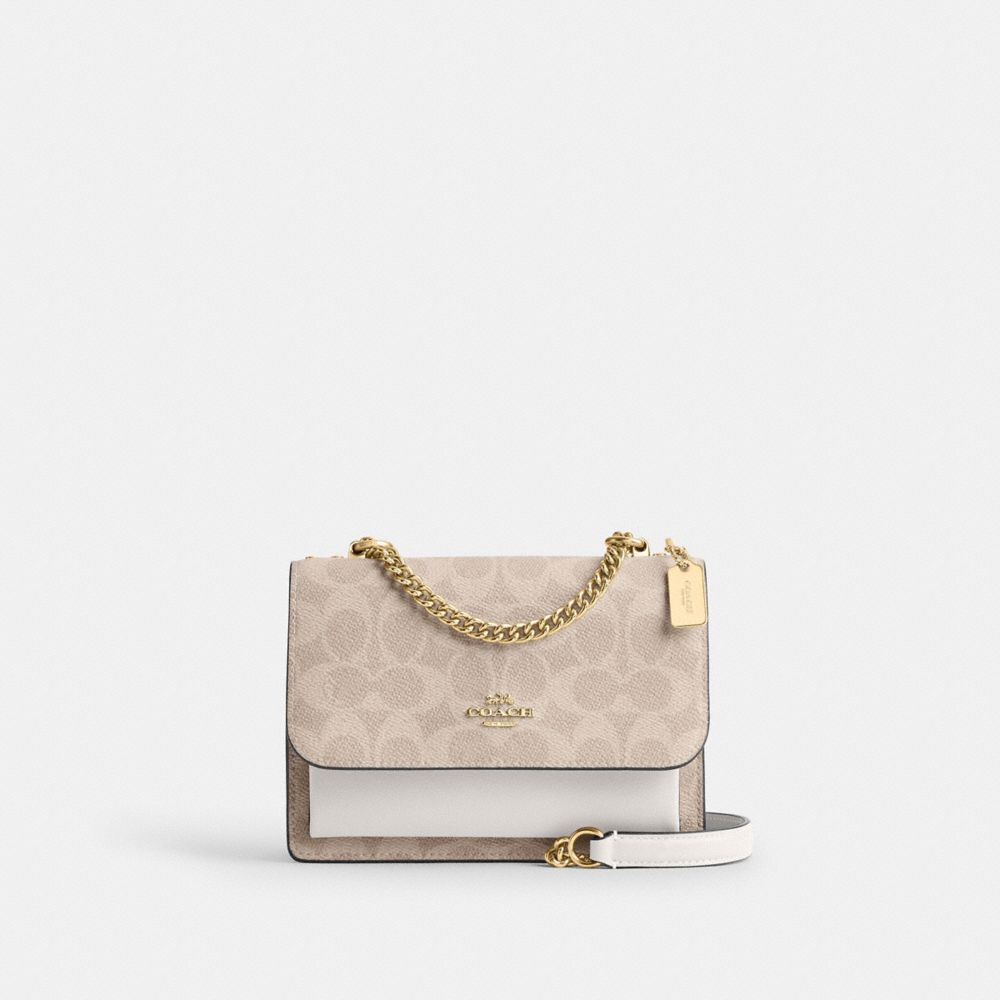 Mini Klare Crossbody Bag In Signature Canvas (Gold/Sand/Chalk)