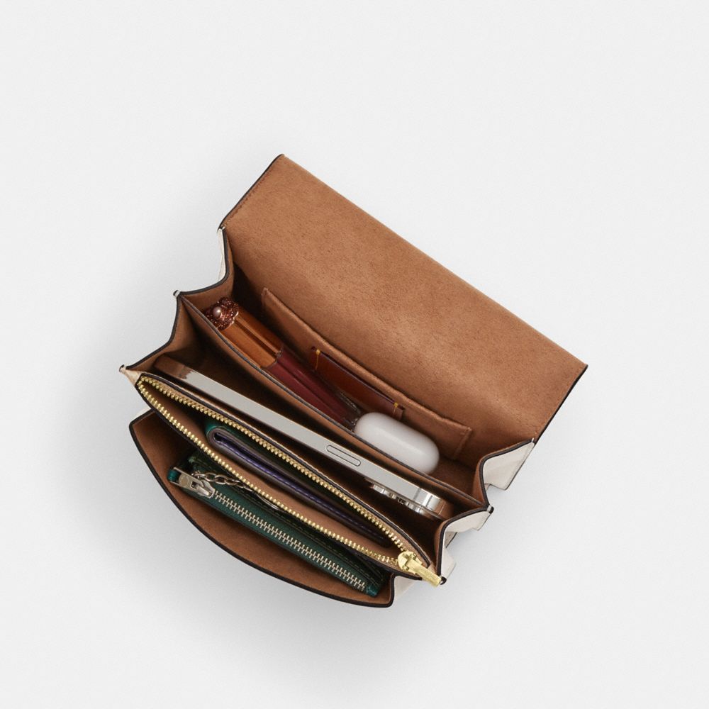 Mini Klare Crossbody Bag In Signature Canvas (Gold/Sand/Chalk)