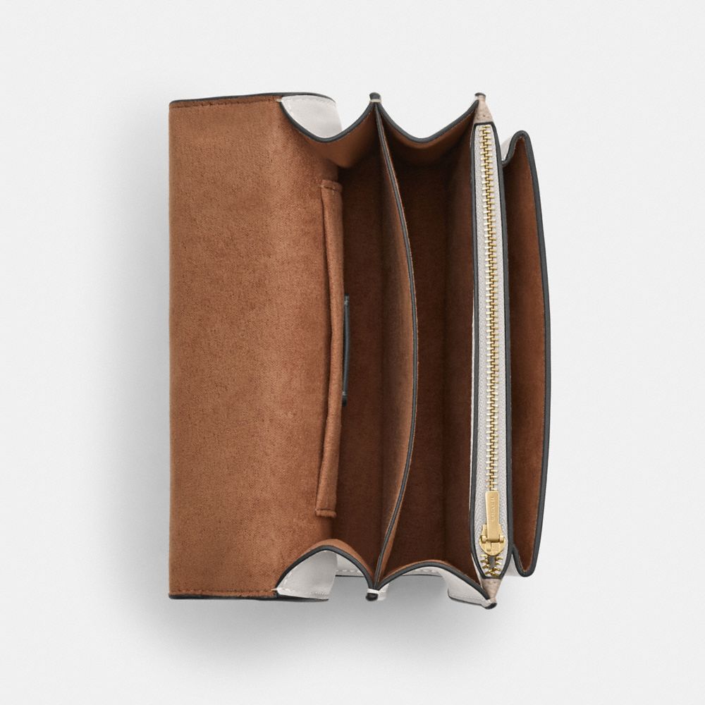 Mini Klare Crossbody Bag In Signature Canvas (Gold/Sand/Chalk)