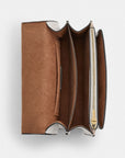 Mini Klare Crossbody Bag In Signature Canvas (Gold/Sand/Chalk)