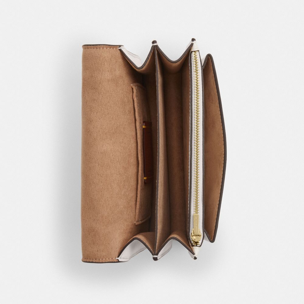 Mini Klare Crossbody Bag In Signature Canvas (Gold/White/Chalk)