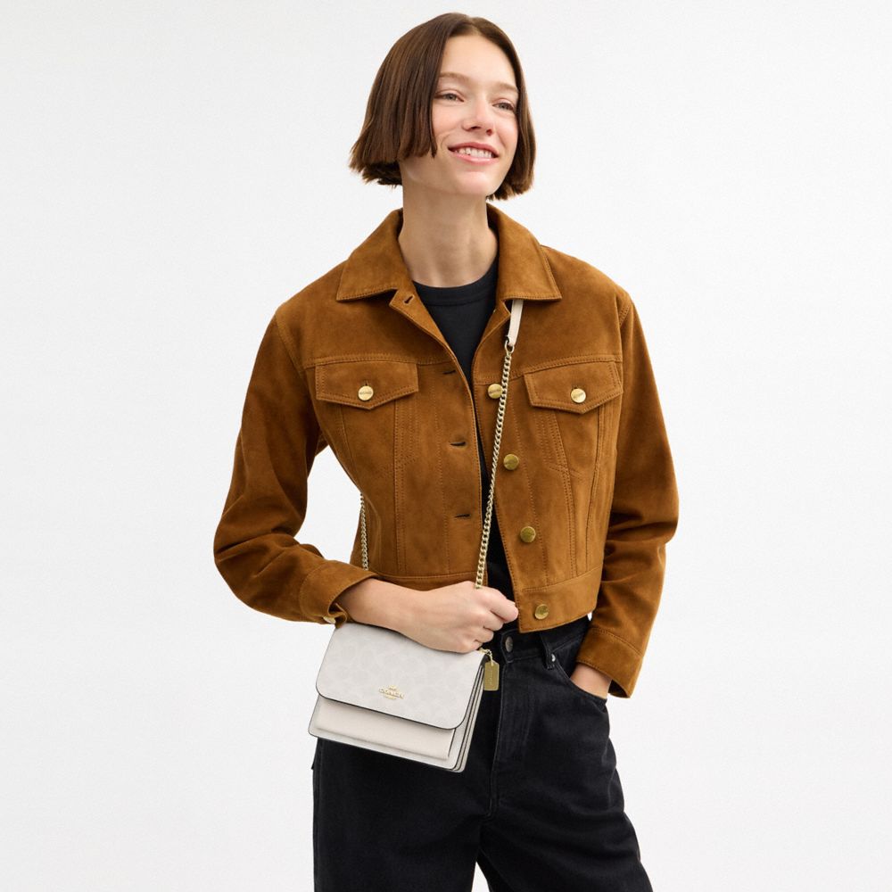 Mini Klare Crossbody Bag In Signature Canvas (Gold/White/Chalk)