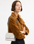 Mini Klare Crossbody Bag In Signature Canvas (Gold/White/Chalk)
