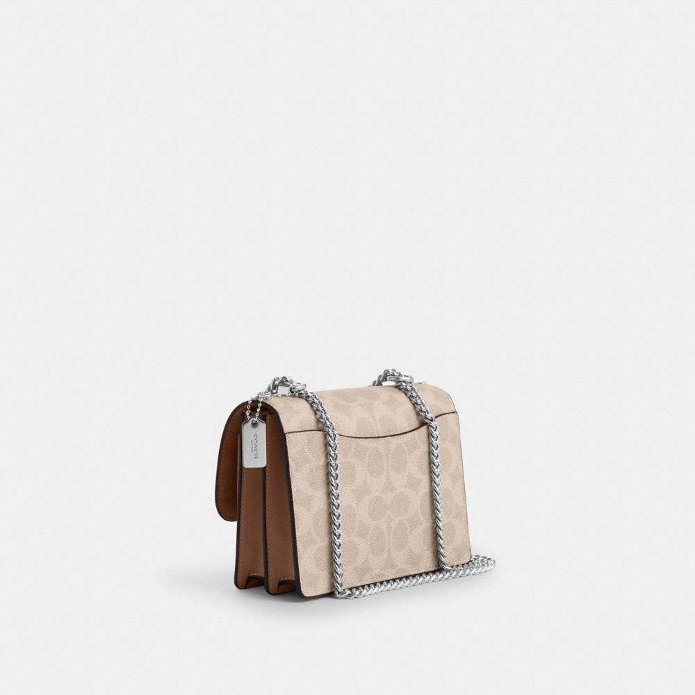 Mini Klare Crossbody Bag In Signature Canvas (Silver/Sand/Taupe)