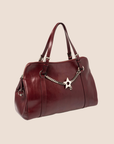 CHRISTIAN DOR BURGUNDY LEATHER PIERCED HARDCORE TOTE BAG
